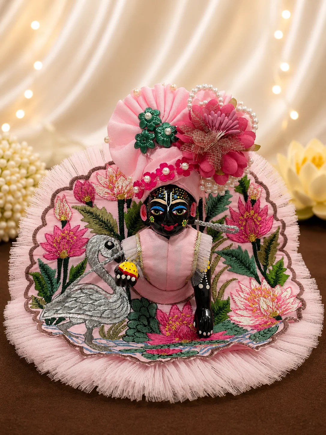 Blossom pink Kanha Ji dress featuring embroidered lotus and swan motifs with matching pink floral pagdi