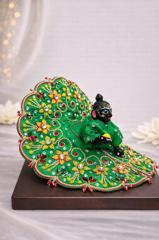 Green handcrafted Laddu Gopal dress with floral stone work. Premium quality zari work laddu gopal poshak.