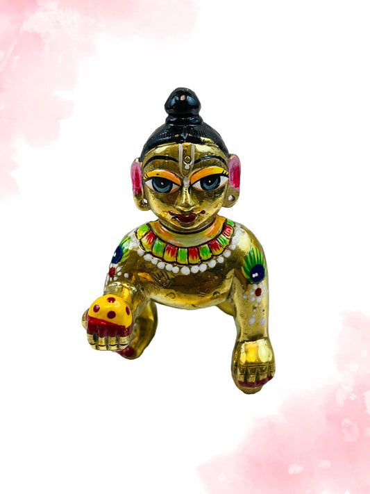 Ashtadhatu Laddu Gopal Vigraha in golden finish – crawling pose idol with hand-painted details and laddu.
