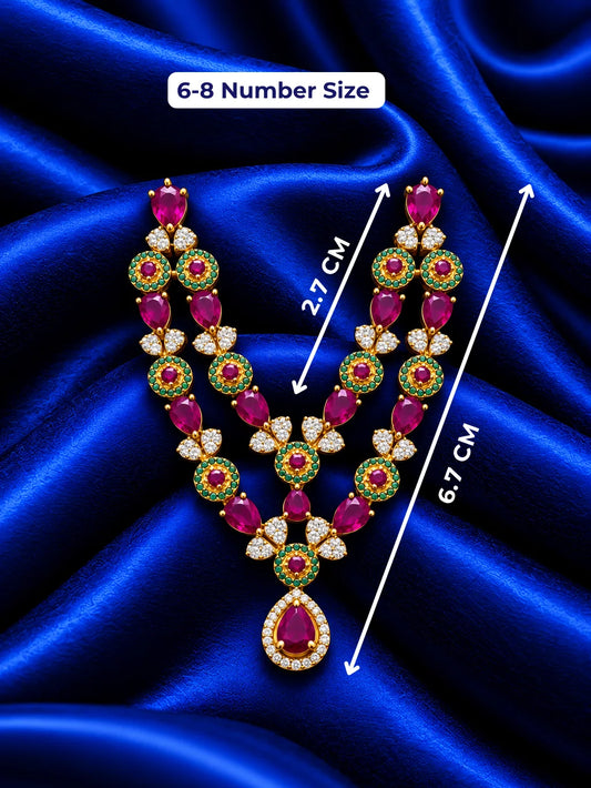 Shop Manikya Ratnamala AD Necklace for Deity with ruby-inspired accents and sparkling AD work. A regal jewellery piece for Laddu Gopal and festive shringar.
