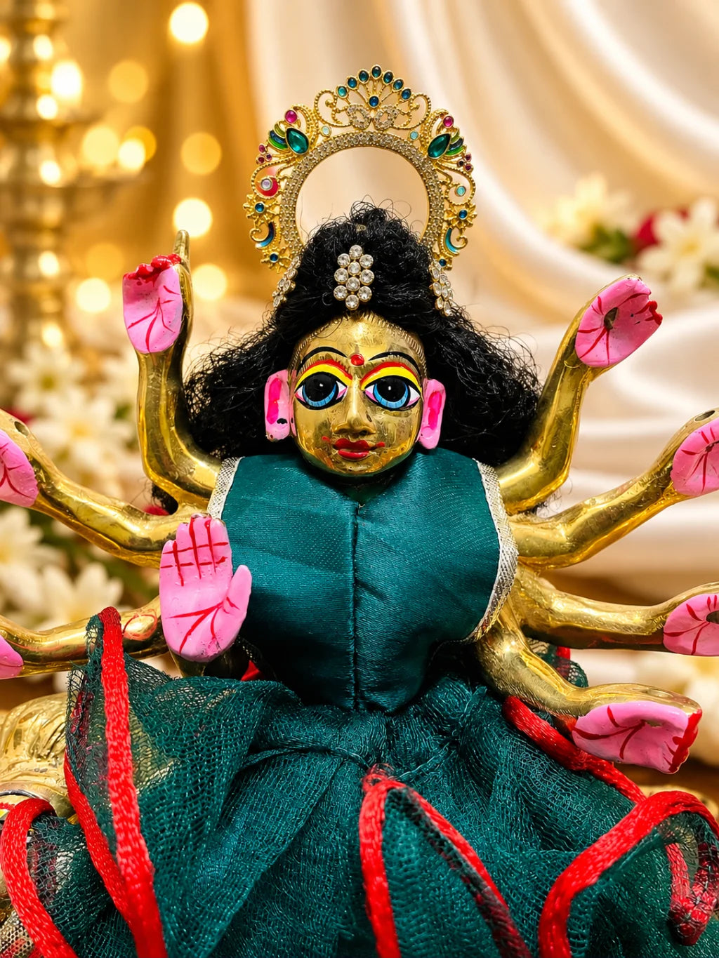 Mayur Panna Darbar AD Chandrika for Deity featuring royal peacock-inspired ornamentation, emerald-green jewel-inspired accents and sparkling American Diamond detailing for traditional deity shringar.