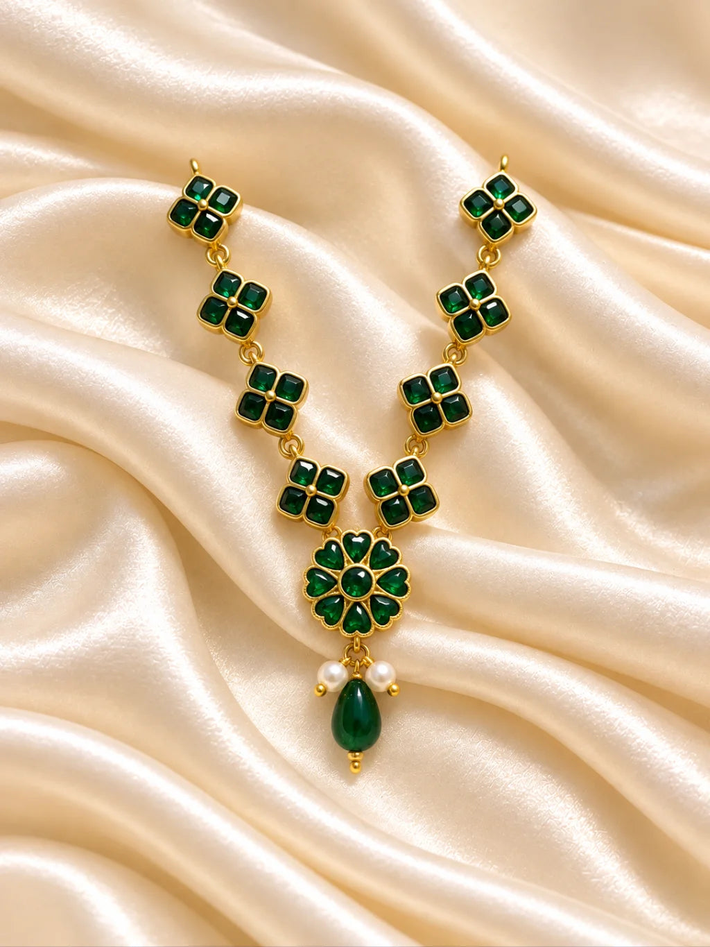 Panna Kusum Necklace and Bansuri Set for Deity featuring emerald-green inspired floral jewellery and a matching decorative Krishna flute for Laddu Gopal shringar