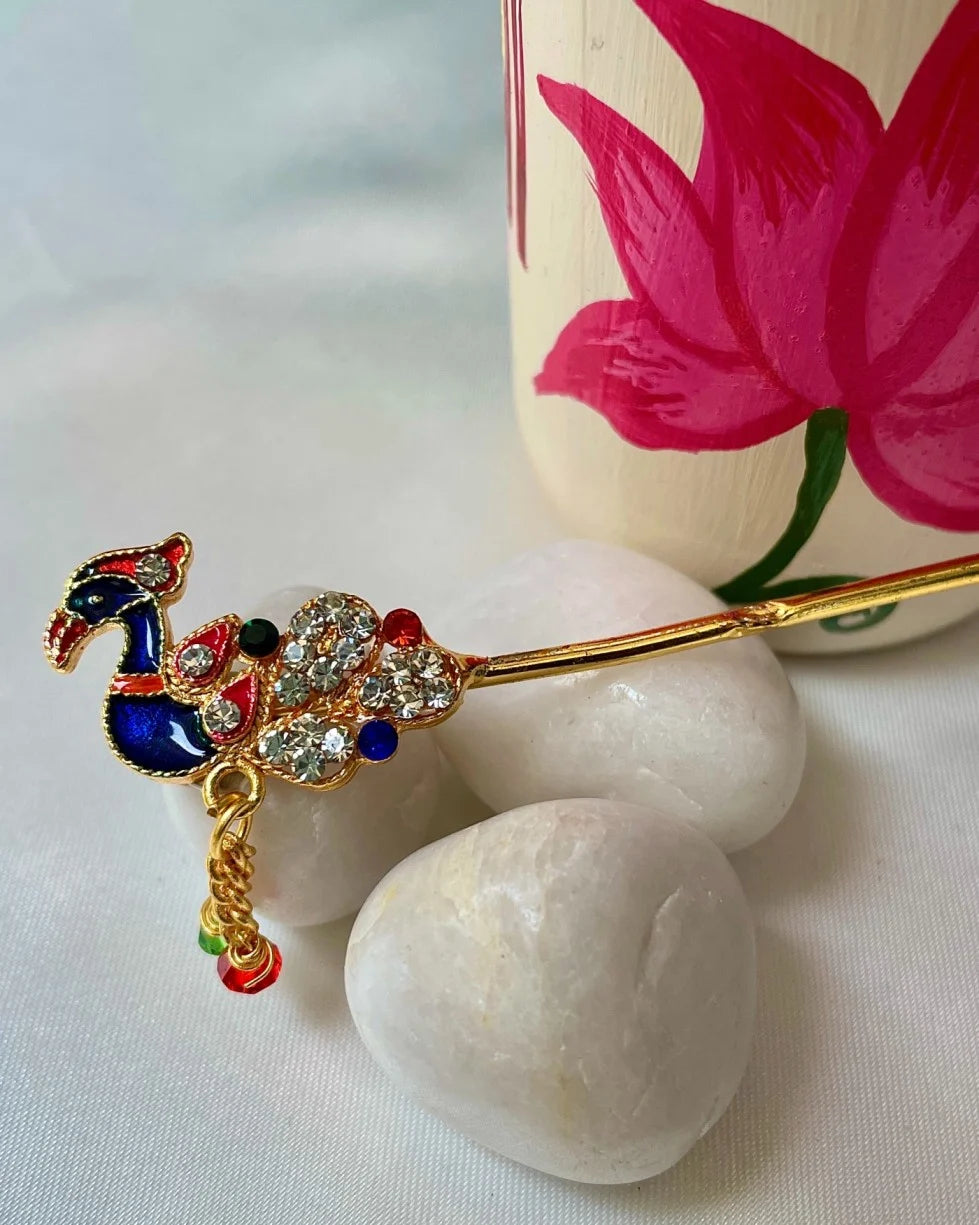 Laddu Gopal Bansuri with peacock head and multicolor crystals – divine flute for Krishna idol decoration.