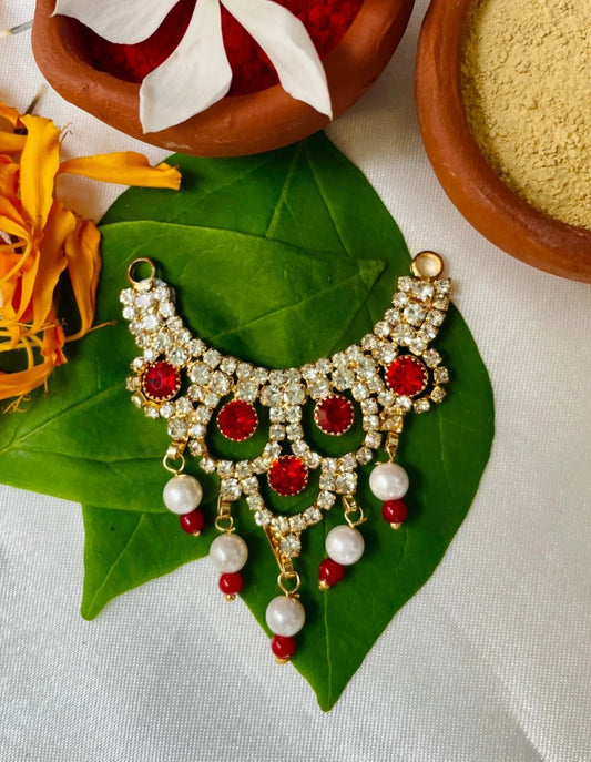 Laddu Gopal jewellery with red stones, pearl hangings, and diamond accents – divine necklace for Bal Gopal.