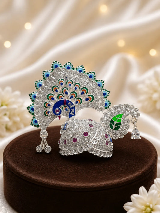 Silver color Peacock Utsav AD Mukut for Laddu Gopal with sparkling peacock-inspired AD design