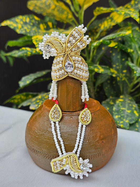 White pearl and gold Laddu Gopal jewellery set with mukut and mala – traditional shringar set for Kanha Ji.