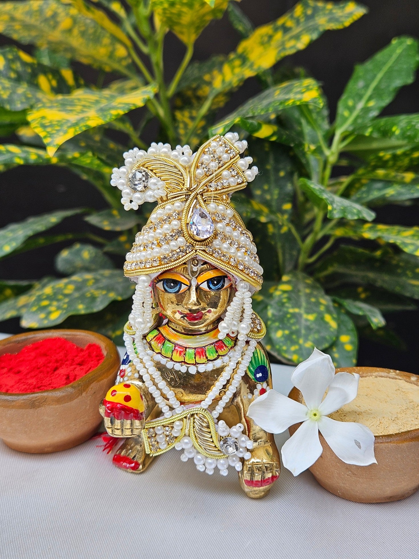 White pearl and gold Laddu Gopal jewellery set with mukut and mala – traditional shringar set for Kanha Ji.