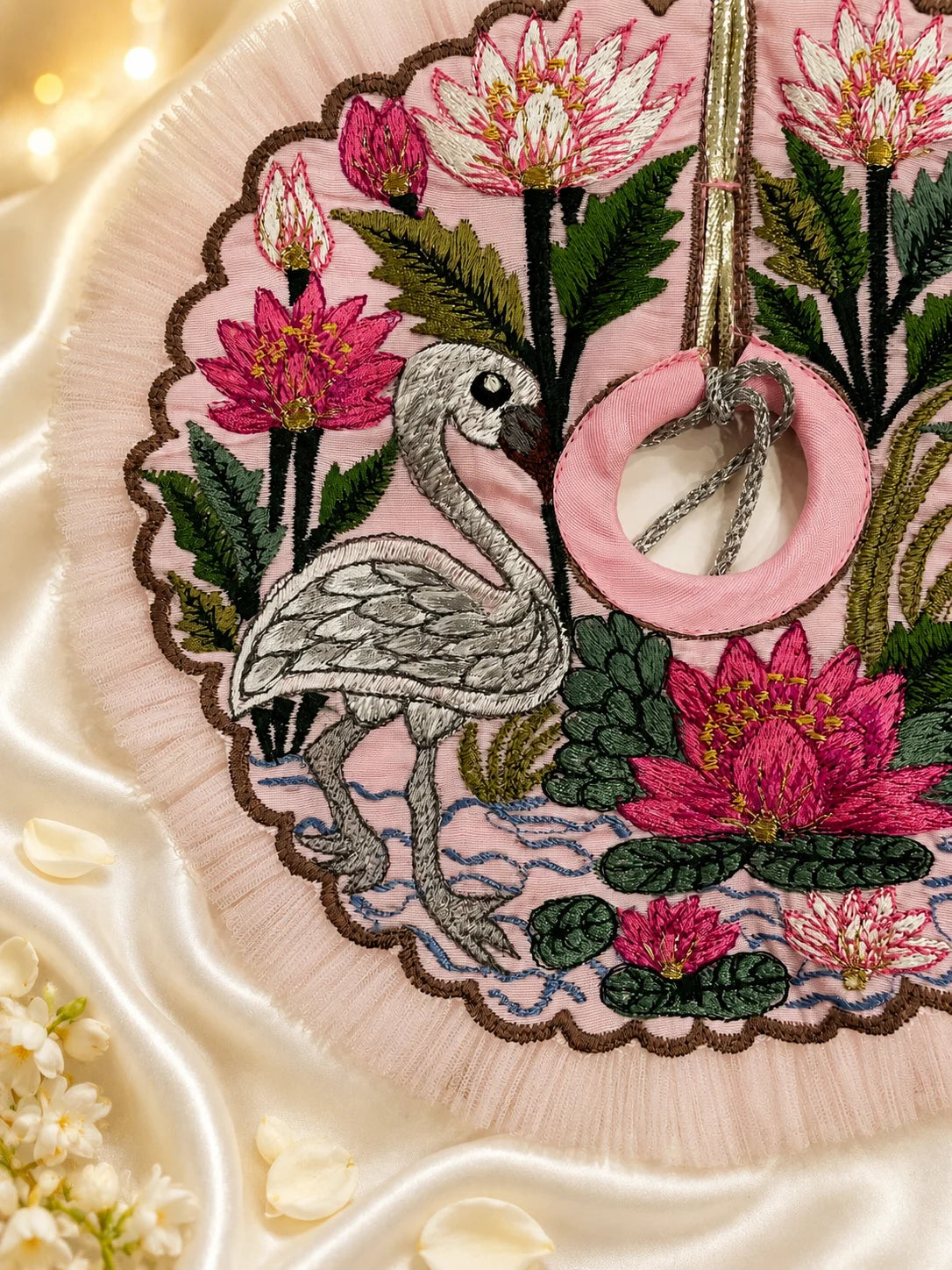 Blossom pink Kanha Ji dress featuring embroidered lotus and swan motifs with matching pink floral pagdi