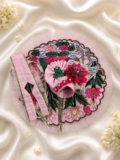 Blossom pink Kanha Ji dress featuring embroidered lotus and swan motifs with matching pink floral pagdi