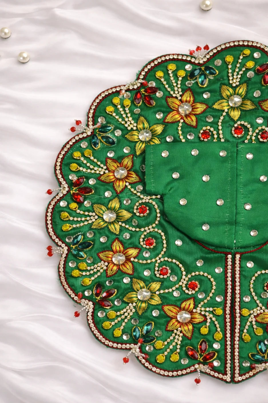 Green handcrafted Laddu Gopal dress with floral stone work. Premium quality zari work laddu gopal poshak.