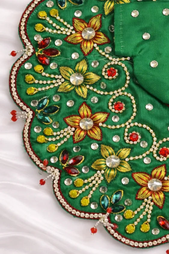 Green handcrafted Laddu Gopal dress with floral stone work. Premium quality zari work laddu gopal poshak.