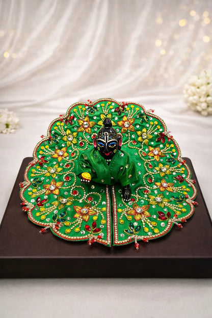 Green handcrafted Laddu Gopal dress with floral stone work. Premium quality zari work laddu gopal poshak.