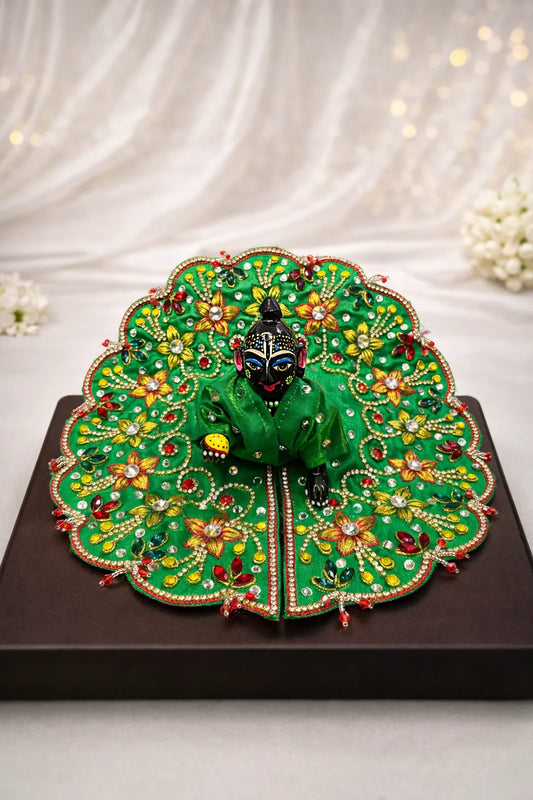 Green handcrafted Laddu Gopal dress with floral stone work. Premium quality zari work laddu gopal poshak.