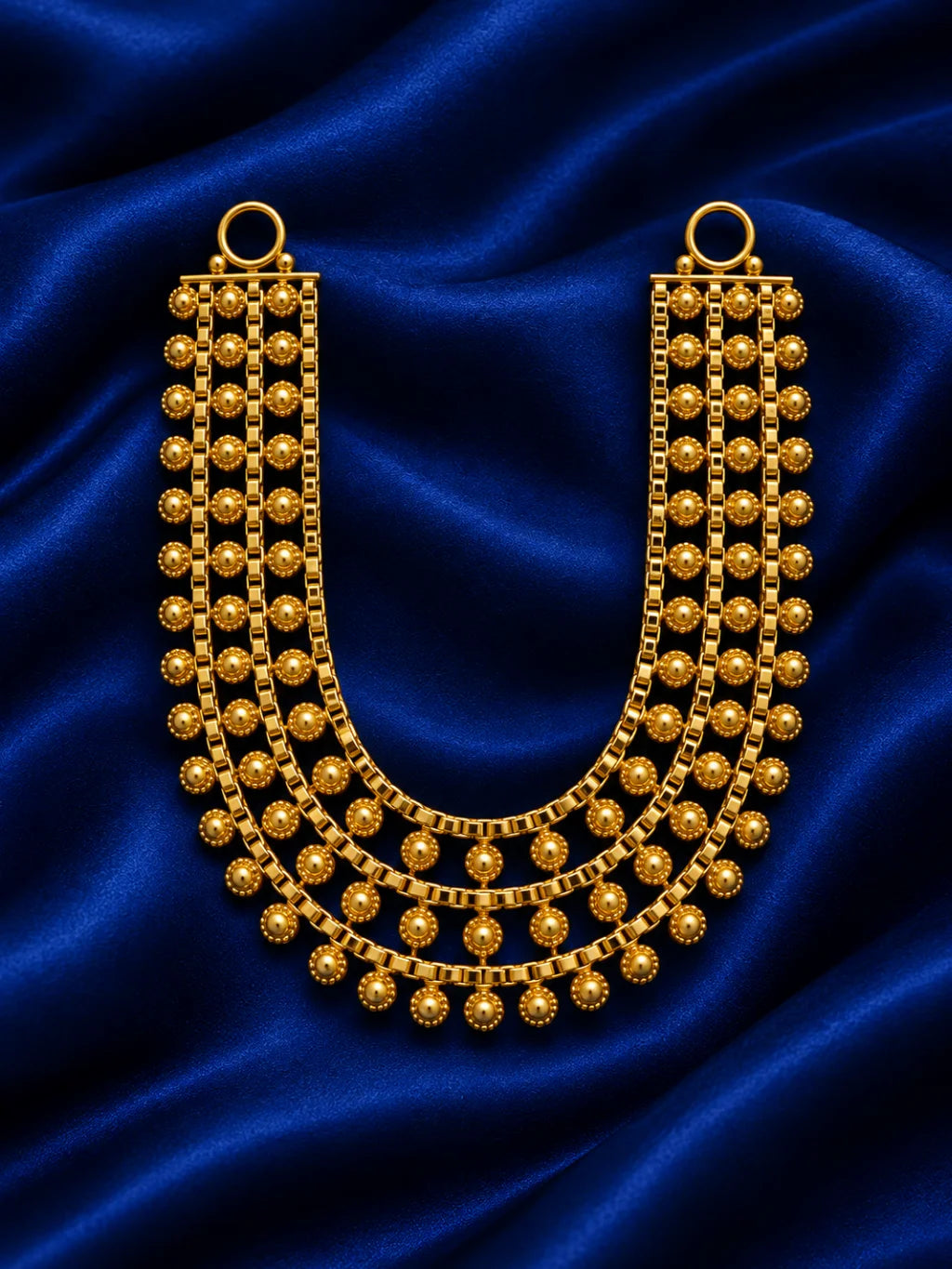 Kanak Dhara Gold Plated Haar for Deity featuring graceful traditional detailing and a rich golden finish. Ideal for Laddu Gopal and festive divine shringar.
