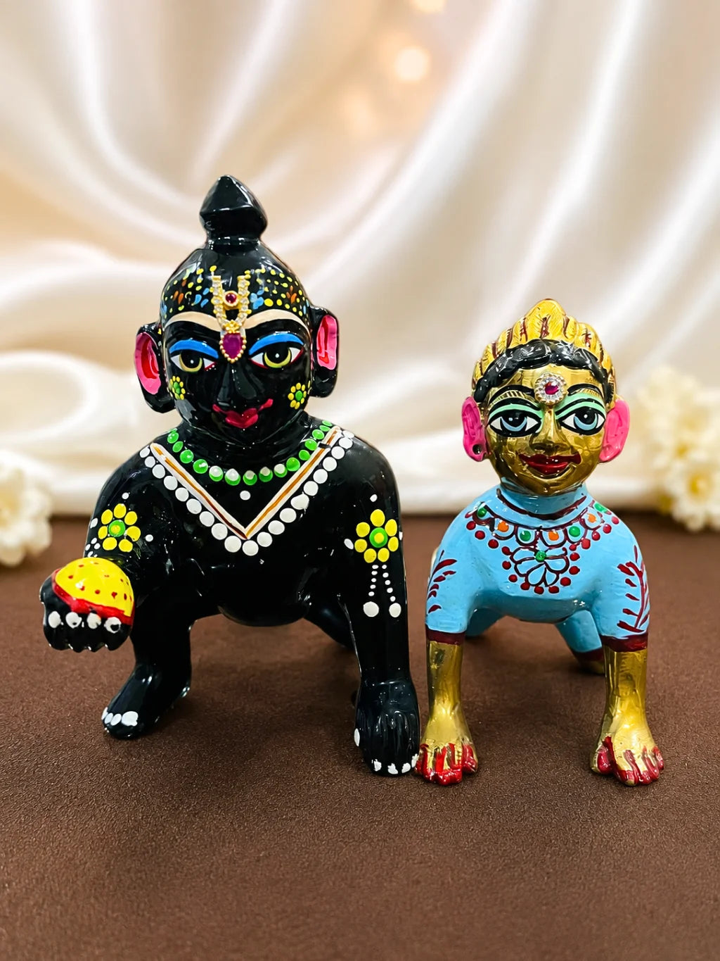 Krishna AD Tilak and Radha AD Bindi combo, designed to add an elegant sparkle to your beloved deities.