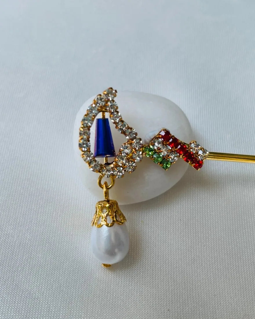 Laddu Gopal bansuri with multicolored crystals and blue stone, pearl hanging – elegant flute for Bal Gopal shringar.