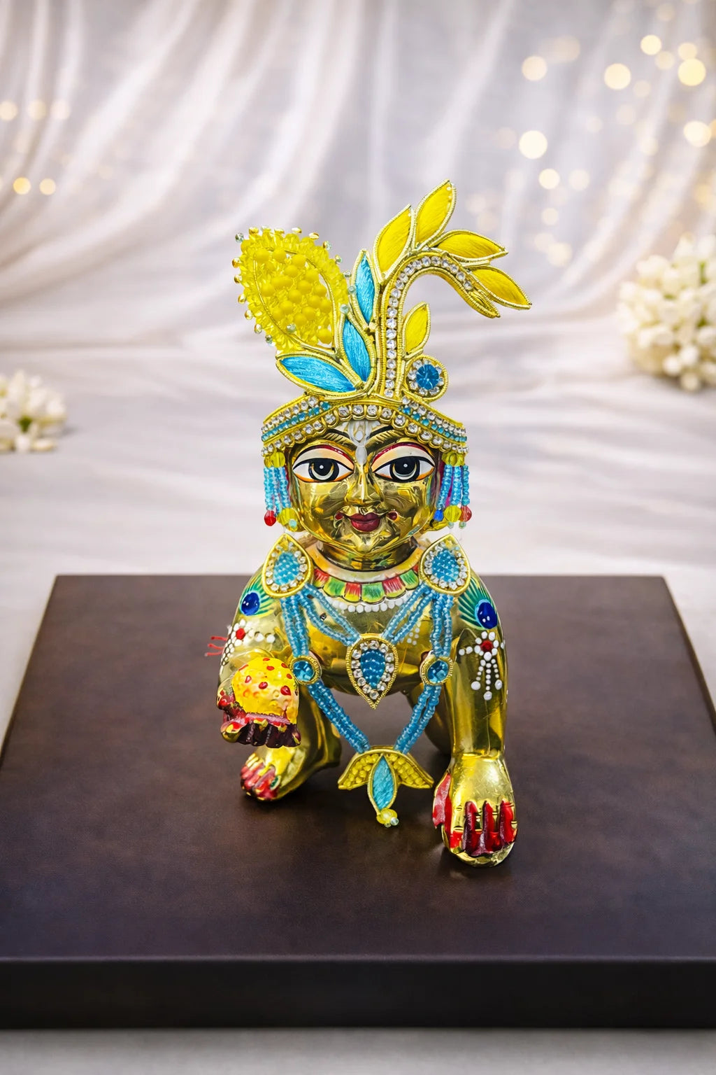 Laddu Gopal yellow and blue mukut with matching mala – handcrafted crown and necklace set for divine shringar.