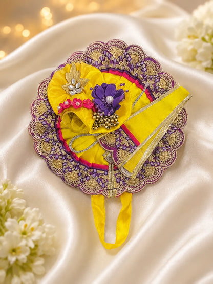Close Up of Purple Scalloped Metallic Zari Lace on Magenta and Yellow Pleated Laddu Gopal Dress