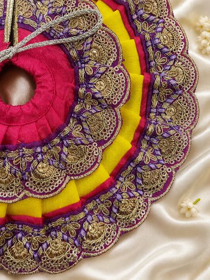 Close Up of Purple Scalloped Metallic Zari Lace on Magenta and Yellow Pleated Laddu Gopal Dress