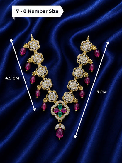 Majestic gold plated floral American Diamond necklace with ruby and emerald stone drops for deity shringar