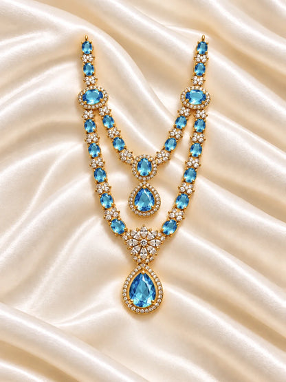 Manikya Kusumavali AD Necklace for Deity featuring ruby-inspired floral ornamentation and sparkling American Diamond detailing for Laddu Gopal and Radha Rani shringar
