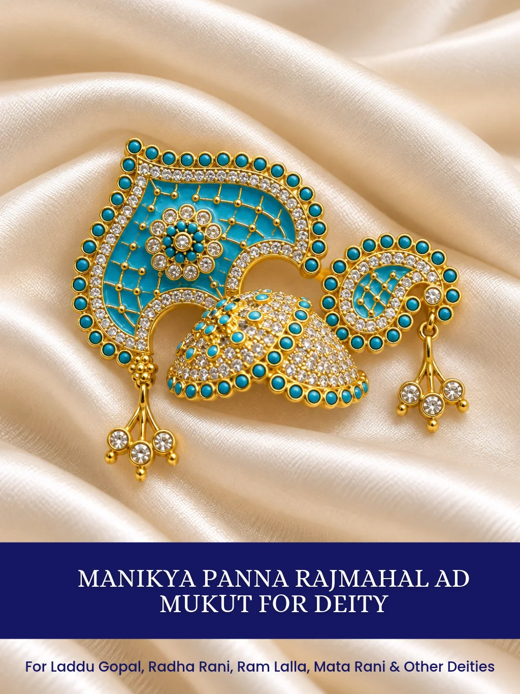 Manikya Panna Rajmahal AD Mukut for Deity featuring ruby-red and emerald-green inspired jewel detailing, royal palace-inspired ornamentation and sparkling American Diamond work for Laddu Gopal shringar.
