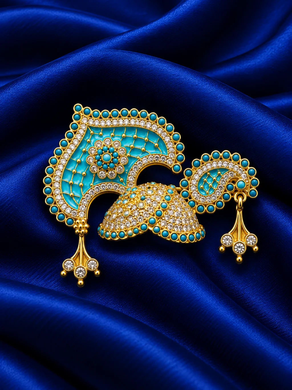 Manikya Panna Rajmahal AD Mukut for Deity featuring ruby-red and emerald-green inspired jewel detailing, royal palace-inspired ornamentation and sparkling American Diamond work for Laddu Gopal shringar.
