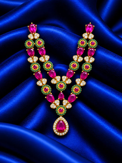 Shop Manikya Ratnamala AD Necklace for Deity with ruby-inspired accents and sparkling AD work. A regal jewellery piece for Laddu Gopal and festive shringar.
