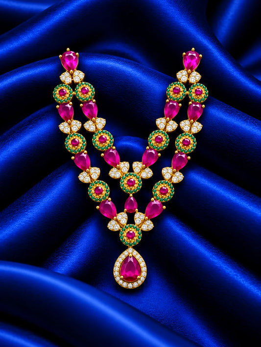 Shop Manikya Ratnamala AD Necklace for Deity with ruby-inspired accents and sparkling AD work. A regal jewellery piece for Laddu Gopal and festive shringar.
