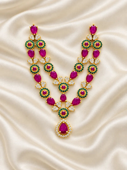 Shop Manikya Ratnamala AD Necklace for Deity with ruby-inspired accents and sparkling AD work. A regal jewellery piece for Laddu Gopal and festive shringar.

