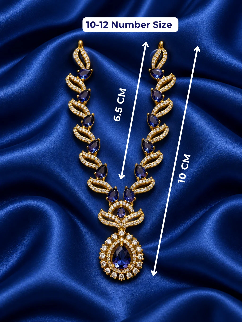 Manikya Tarang AD Necklace for Deity with ruby-inspired accents, flowing wave-style design and sparkling American Diamond detailing

