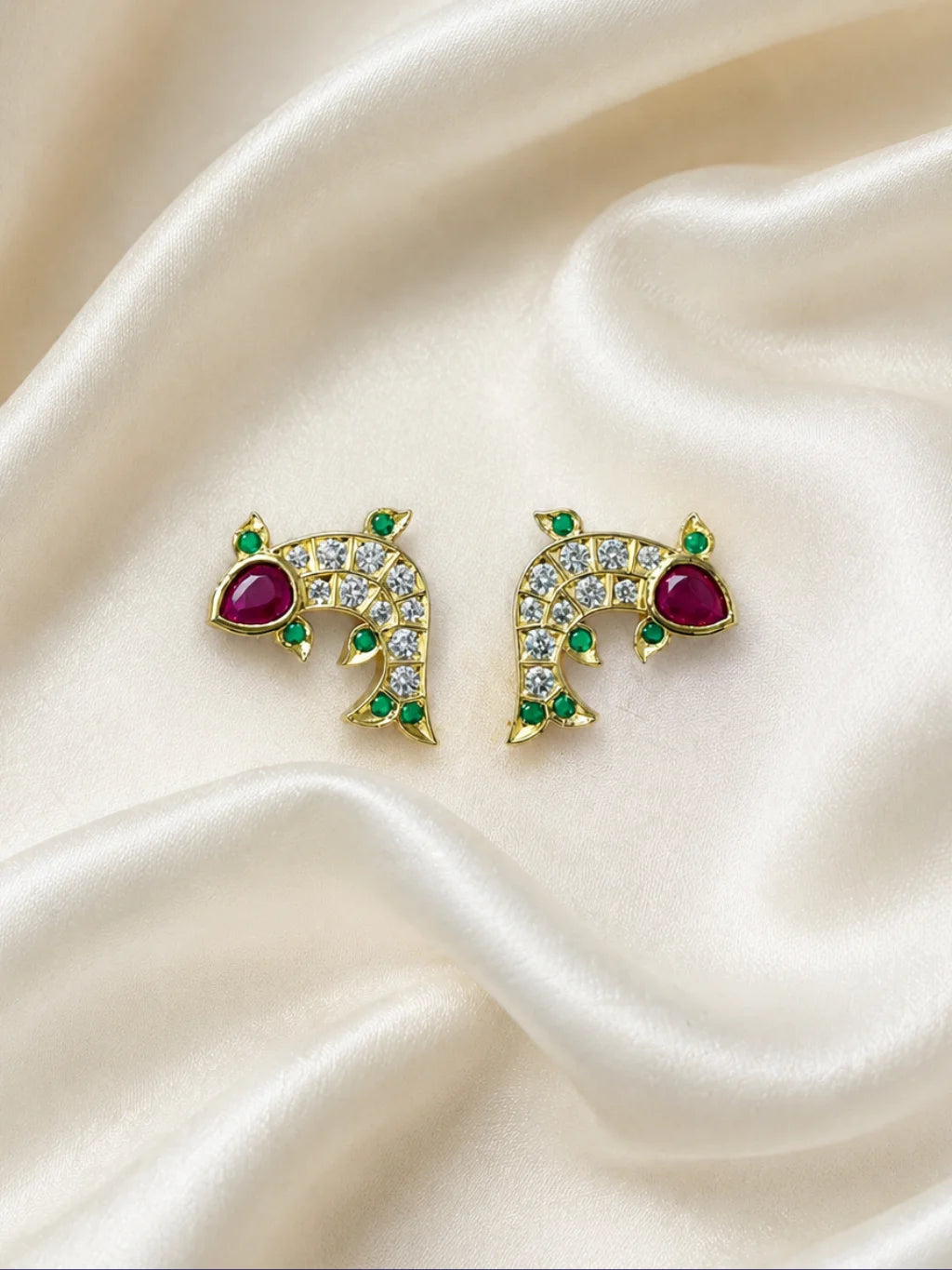 Matsyakrit Milma AD Kundal, featuring a graceful fish-inspired design and sparkling stones for beautiful festive shringar.