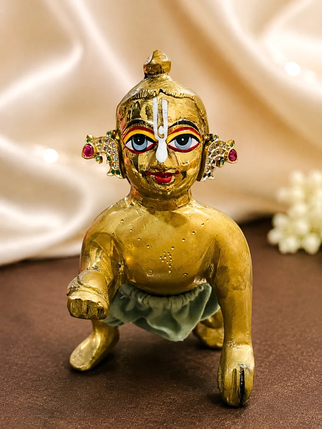 Matsyakrit Milma AD Kundal, featuring a graceful fish-inspired design and sparkling stones for beautiful festive shringar.