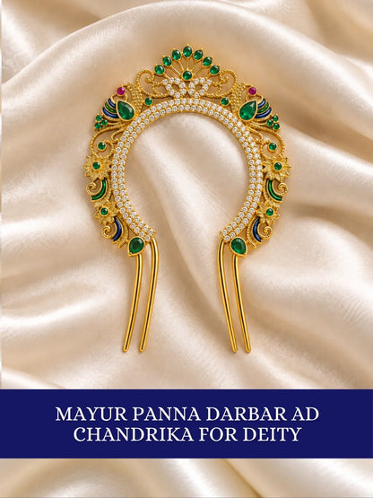 Mayur Panna Darbar AD Chandrika for Deity featuring royal peacock-inspired ornamentation, emerald-green jewel-inspired accents and sparkling American Diamond detailing for traditional deity shringar.
