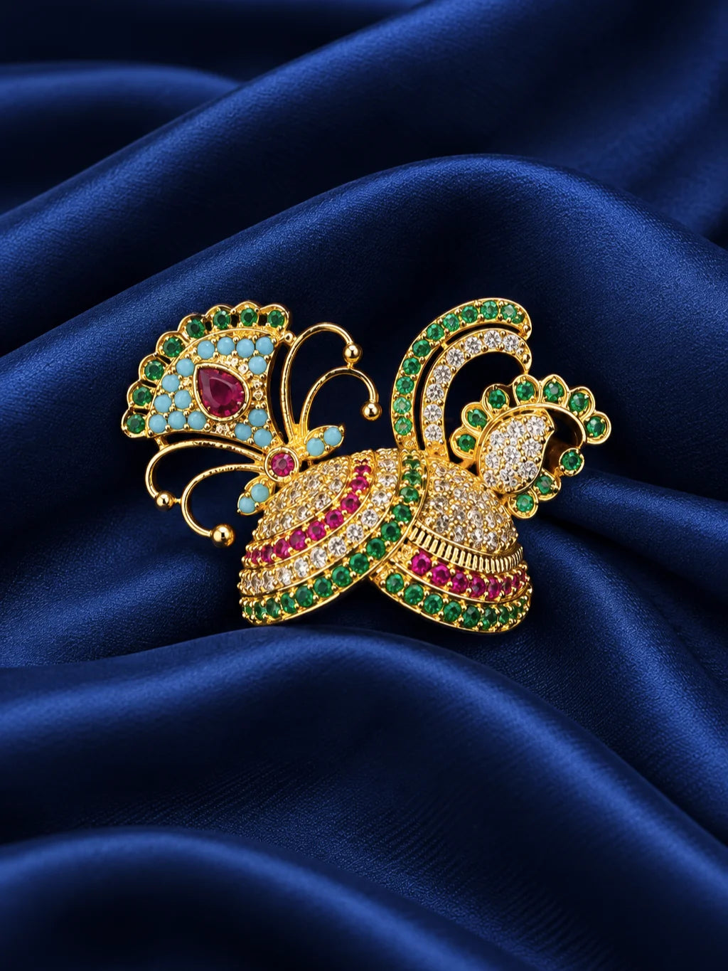 Mayur Ratna Rangmahal AD Mukut for Deity featuring royal peacock-inspired ornamental styling, multicolor jewel-inspired accents and sparkling American Diamond detailing for Laddu Gopal and Krishna Ji shringar.

