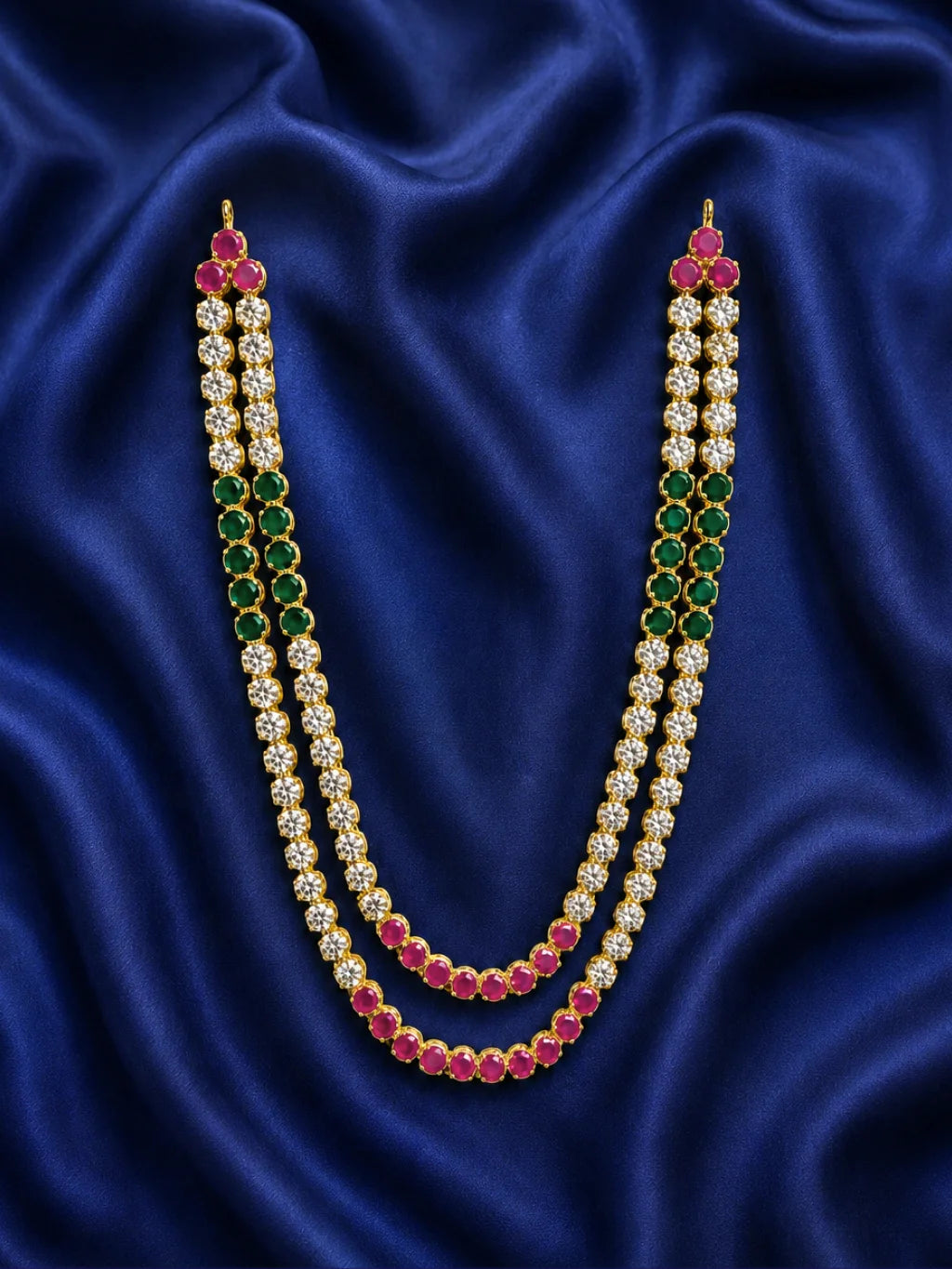 Adorn your deity with the Nayantara AD Haar, featuring sparkling AD stones for an elegant and radiant appearance during puja and festivals.