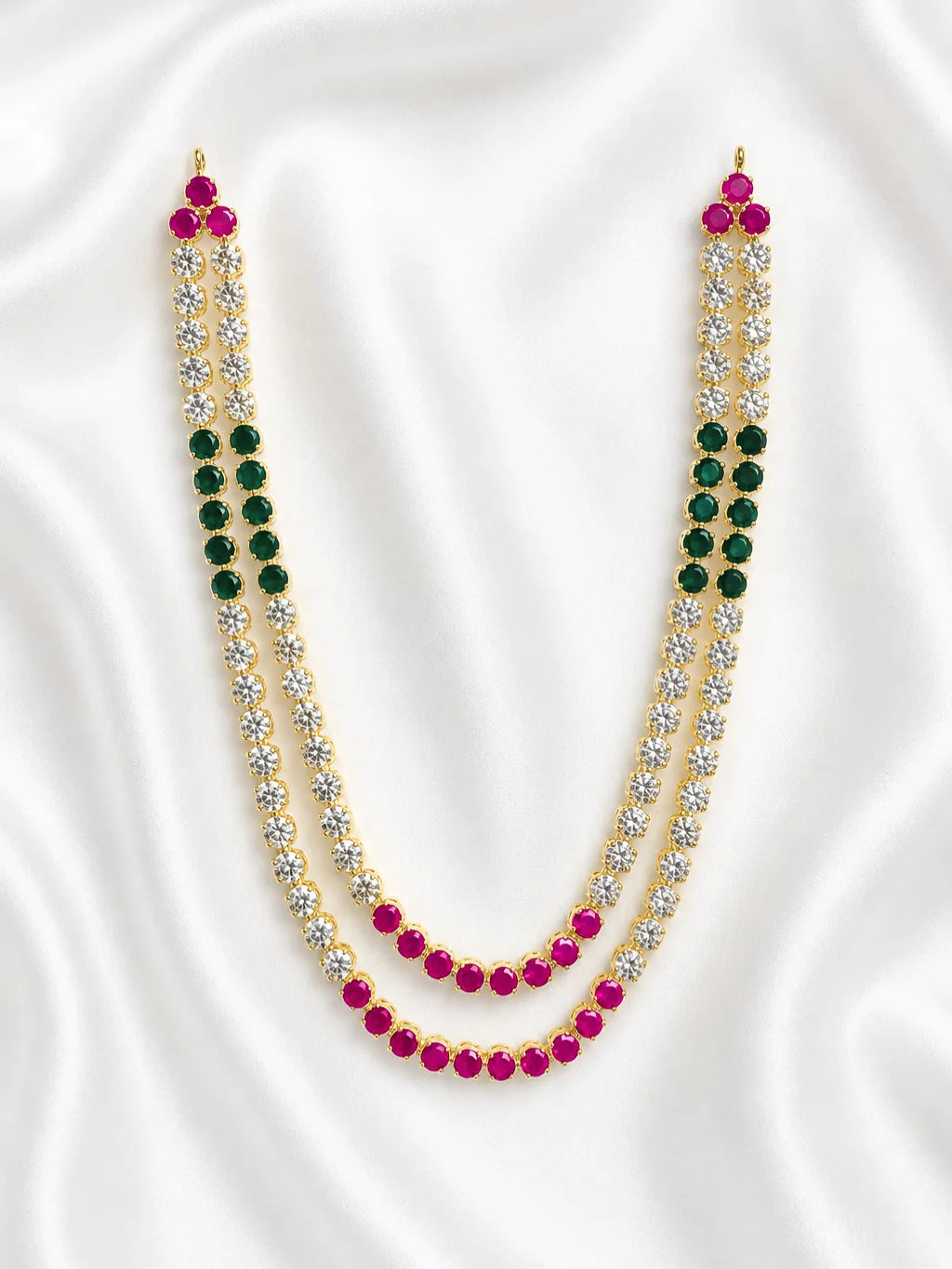 Adorn your deity with the Nayantara AD Haar, featuring sparkling AD stones for an elegant and radiant appearance during puja and festivals.