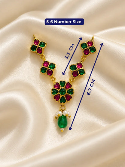Panna Hridayika Necklace for Deity featuring emerald-green inspired heart design ornamentation for Laddu Gopal, Radha Rani and traditional Krishna Ji shringar.
