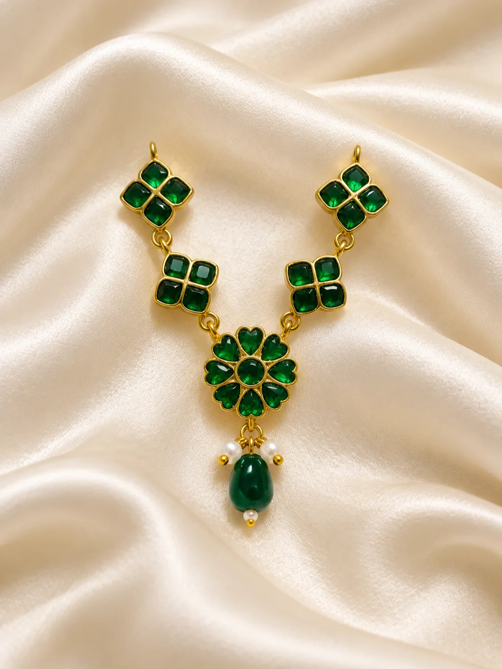 Panna Hridayika Necklace for Deity featuring emerald-green inspired heart design ornamentation for Laddu Gopal, Radha Rani and traditional Krishna Ji shringar.
