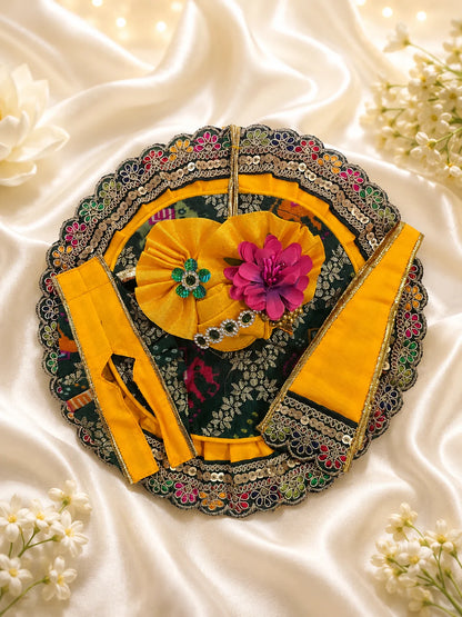 Traditional Green and Yellow Patola Print Laddu Gopal Poshak Set with Sequin Lace Border Flatlay