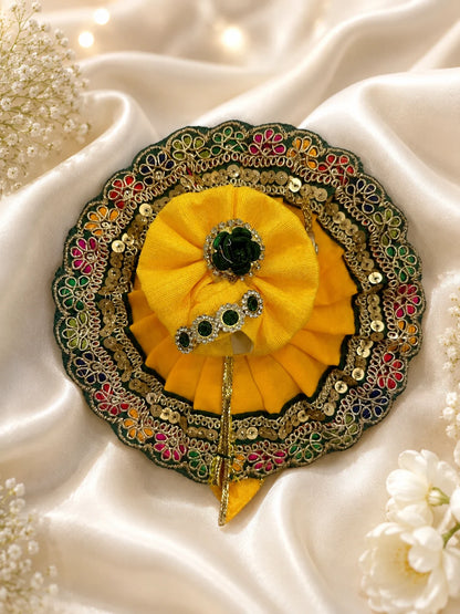 Traditional Green and Yellow Patola Print Laddu Gopal Poshak Set with Sequin Lace Border Flatlay