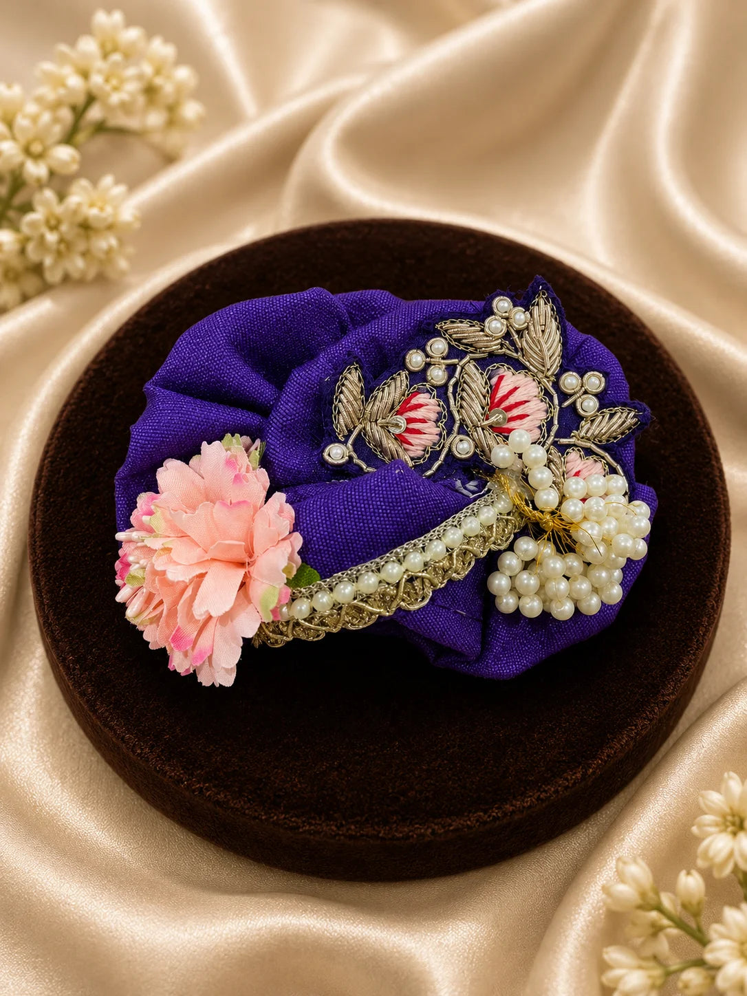 Royal purple Laddu Gopal dress set with detailed silver embroidery, embroidered peacock motif, pearl border, matching patka, and pink flower pagdi turban on white silk fabric