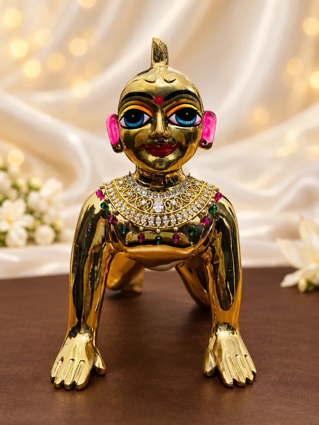 Shop Rajsi Ratnashree AD Necklace for Deity with regal jewel-inspired detailing and sparkling AD stones. Elegant jewellery for Laddu Gopal and festive shringar.
