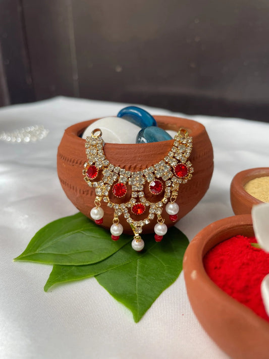 Laddu Gopal jewellery with red stones, pearl hangings, and diamond accents – divine necklace for Bal Gopal.
