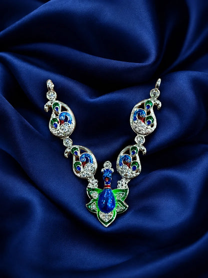 Premium crystal-embedded Meenakari peacock haar for Laddu Gopal Ji on dark blue silk background