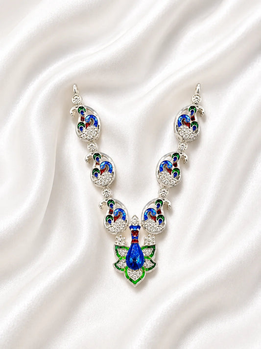 Sacred silver finish blue and green Meenakari peacock necklace for deity shringar on white fabric