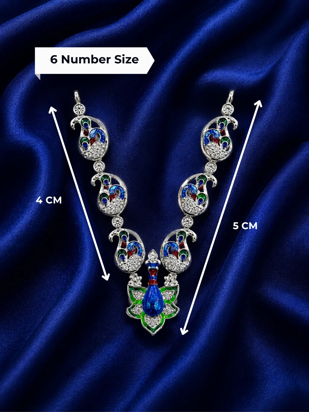 Premium crystal-embedded Meenakari peacock haar for Laddu Gopal Ji on dark blue silk background