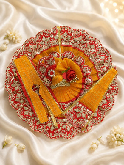 Close Up of Emerald Green Scalloped Metallic Zari Lace and Sequins on Yellow Textured Laddu Gopal Dress

