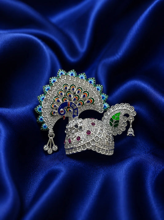 Silver color Peacock Utsav AD Mukut for Laddu Gopal with sparkling peacock-inspired AD design
