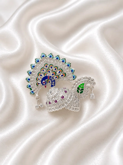 Silver color Peacock Utsav AD Mukut for Laddu Gopal with sparkling peacock-inspired AD design